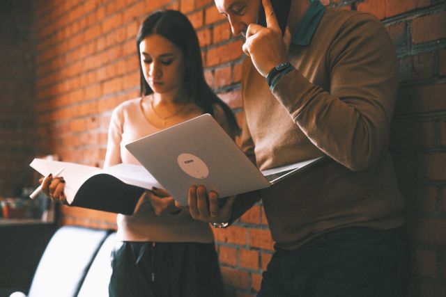 Man Holding Laptop